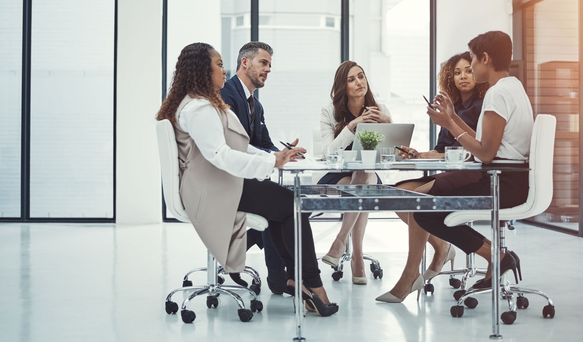 A business meeting in light conference room