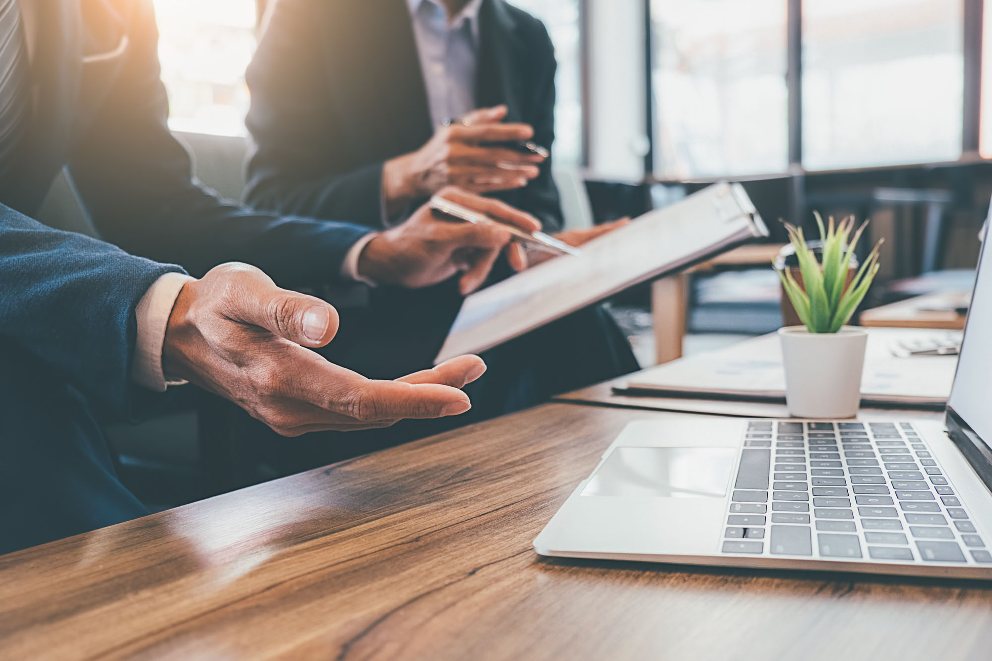 hands working on laptop