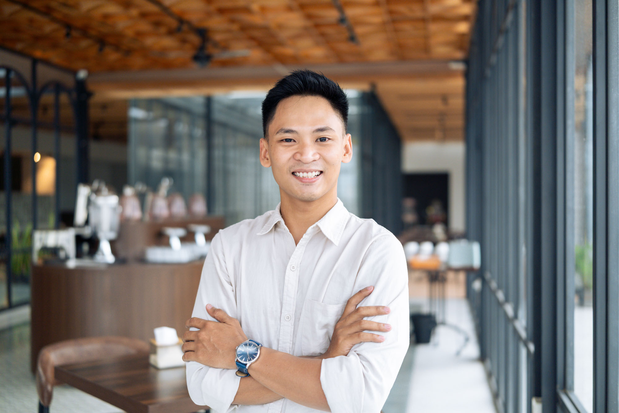 Confident man arms crossed