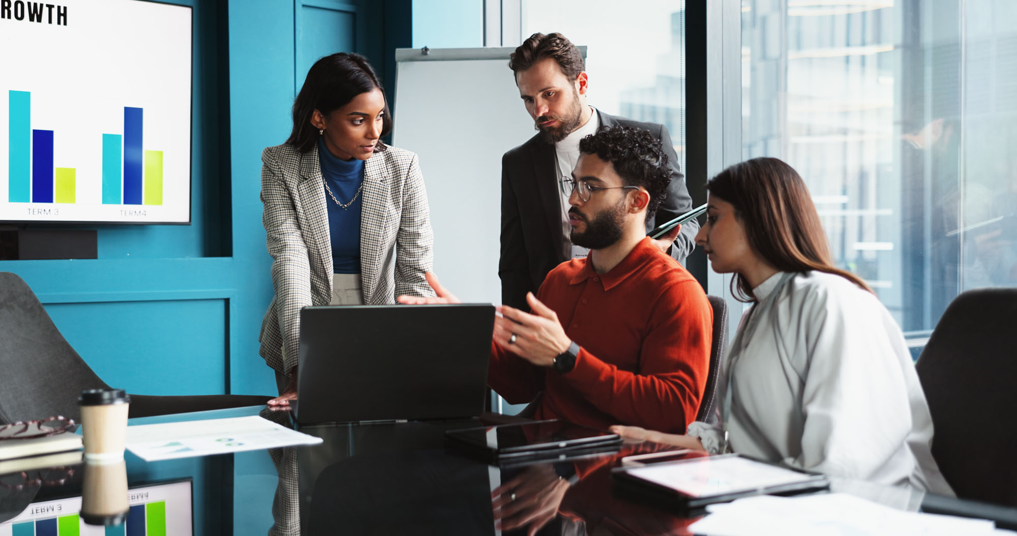 Man explaining a concept to a group of people