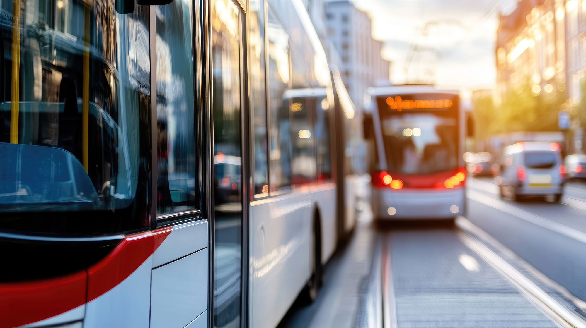 City buses at sunrise